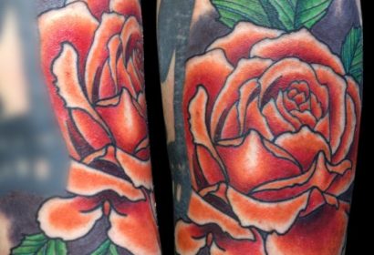 orange rose tattoo by Jake B