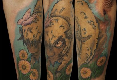 New school buffalo tattoo by Jake B