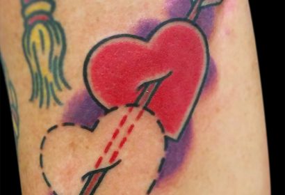 Traditional style heart arrow tattoo by Jake B