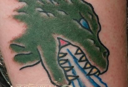 Traditional style godzilla tattoo by Jake B