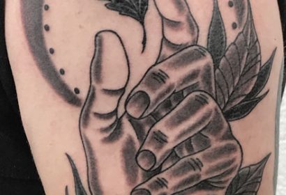 Traditional oak leaf and hand tattoo by jake b