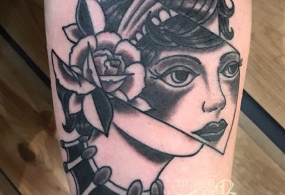 black and grey lady head glitch face tattoo by jake b