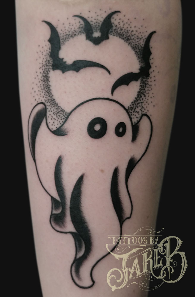 black & grey ghost tattoo