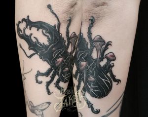 black and grey illustrative style stag beetle tattoo by Jake B