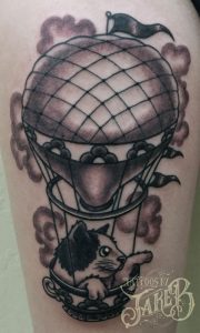 black and grey traditional style cat balloon tattoo by Jake B