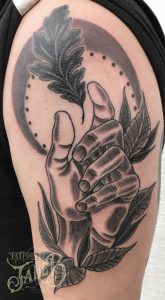 Traditional oak leaf and hand tattoo by jake b