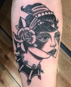 black and grey glitch lady face tattoo by jake b