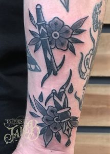 black and grey ink pen tattoo by jake b