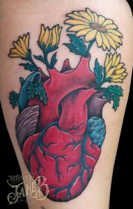 anatomical heart flowers tattoo