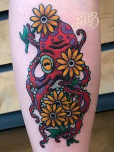 traditional flowers and octopus tattoo by Jake B