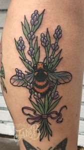 traditional flowers and bee tattoo by Jake B