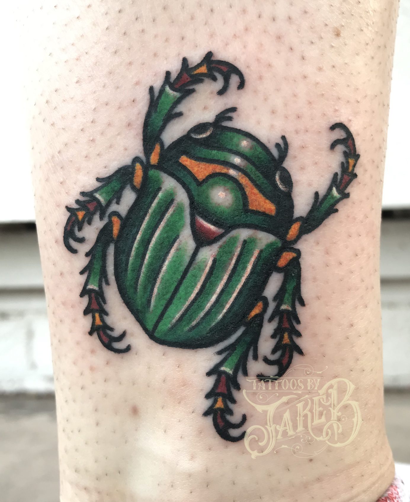traditional green scarab beetle tattoo by Jake B