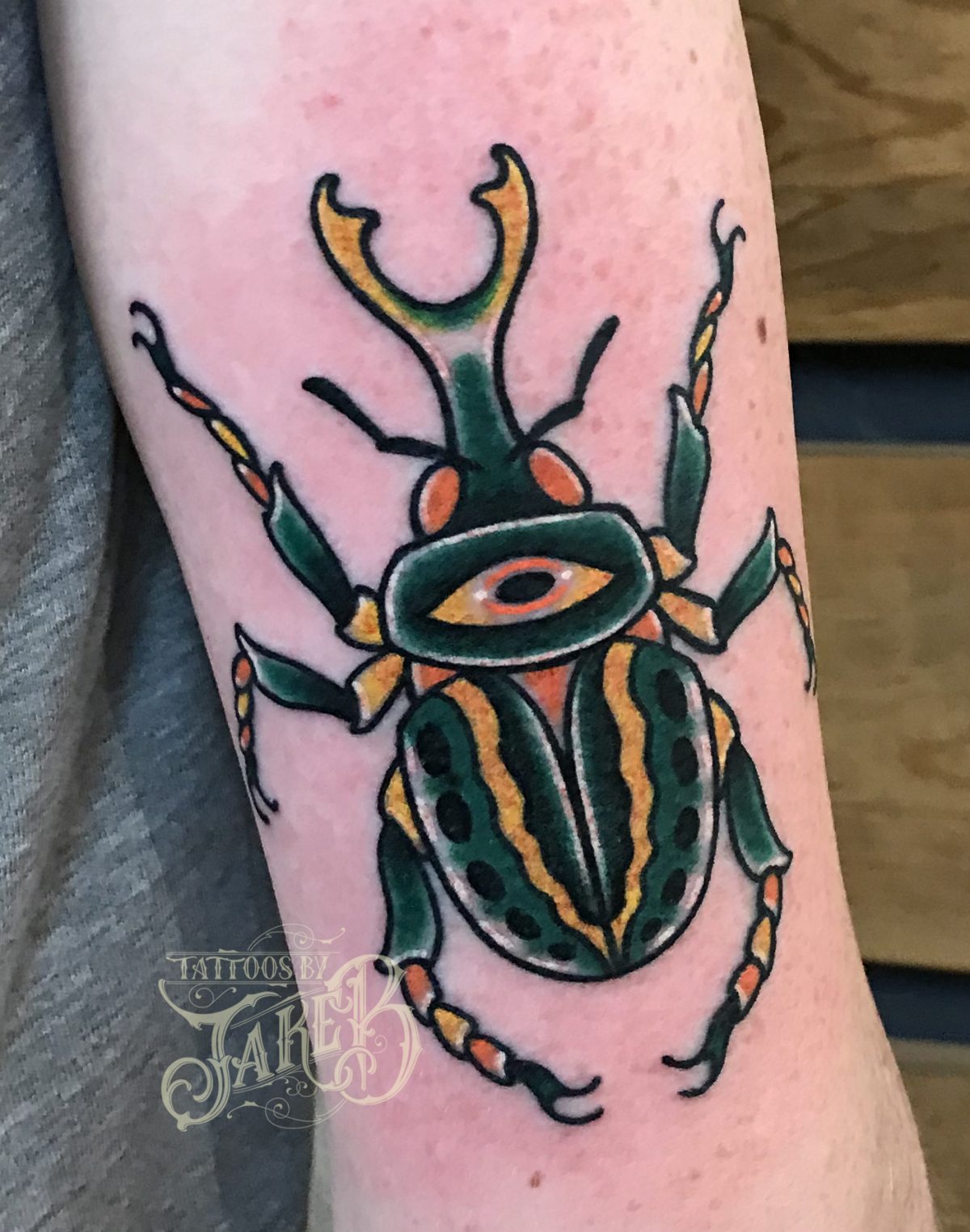 traditional green goliath beetle tattoo by Jake B