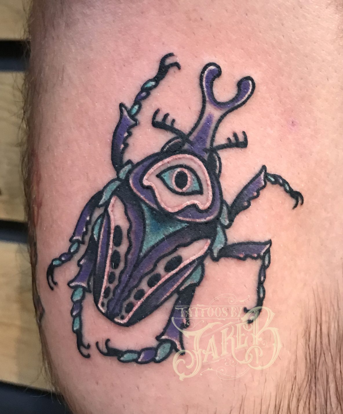 traditional purple goliath beetle tattoo by Jake B