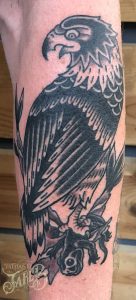 Black & grey falcon tattoo by Jake B