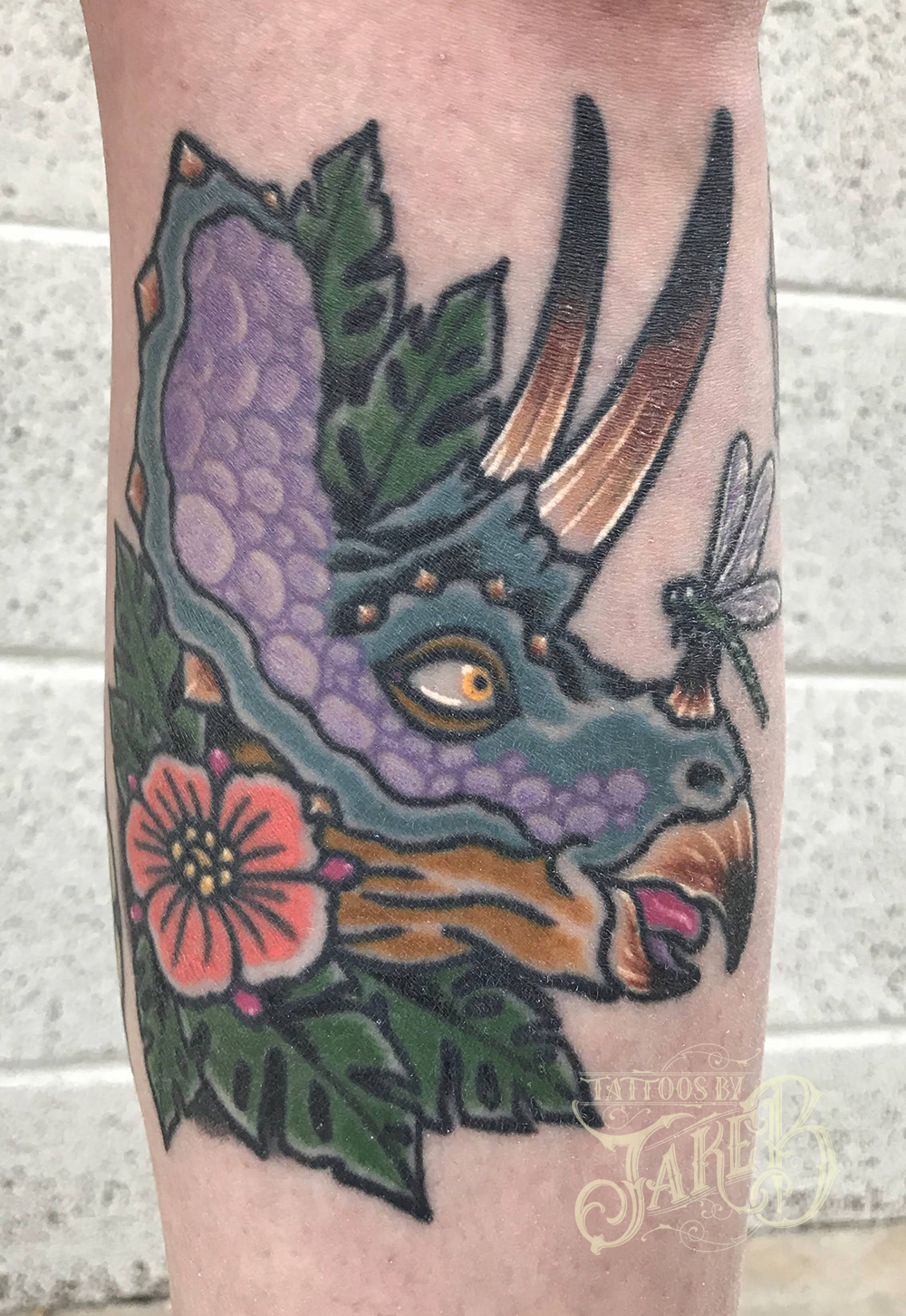 traditional triceratops tattoo by Jake B