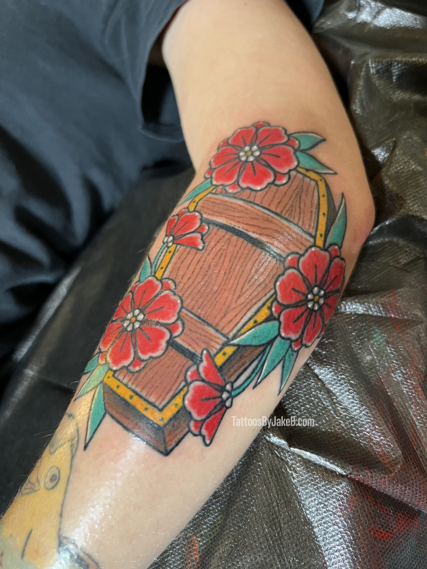 Traditional coffin tattoo by Jake B