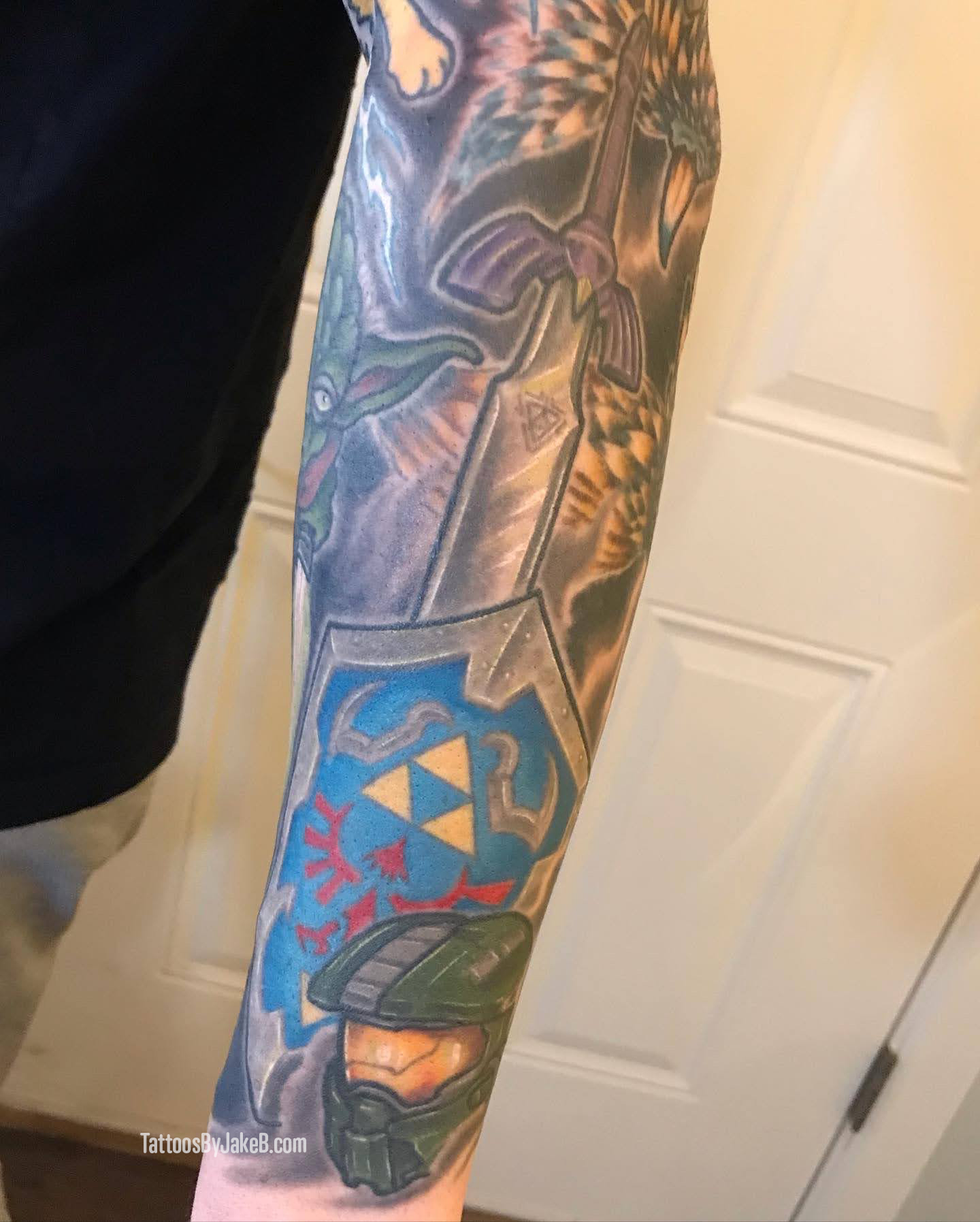 Zelda Master Sword and Shield tattoo by Jake B